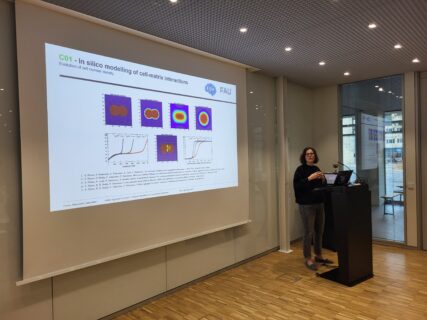 Katja Kobow presenting updates on cellular mechanics. (A. Dakkouri-Baldauf)